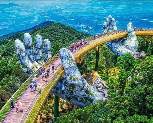 Golden Bridge (Cau Vang) in Da Nang, Vietnam - Iconic pedestrian bridge held by giant stone hands