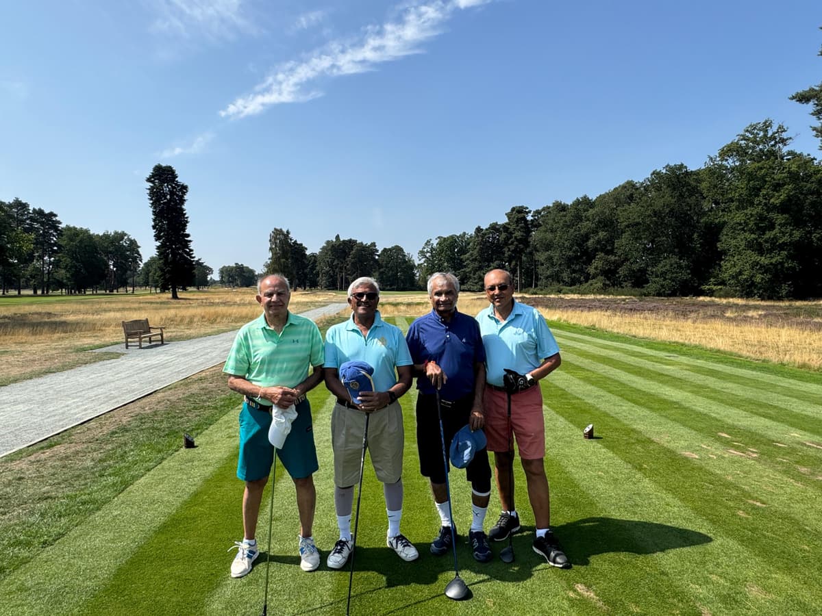 Friends on the tee box after fifty years